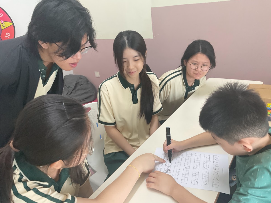 LSL Inclusive Learning Centre - Year 11 Student assisting in lessons.