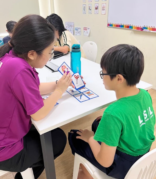 LSL Inclusive Learning Centre - Year 11 Student assisting in lessons.